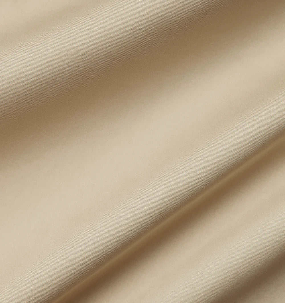 Beige fabric with folds and shadows